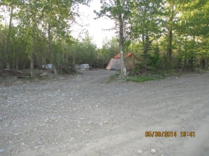 Tent pitched in a treed tenting site, Riverbend Campground, Okotoks south of Calgary, Alberta