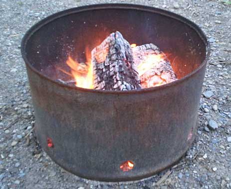 A moveable metal firepit is placed on each short-term campsite